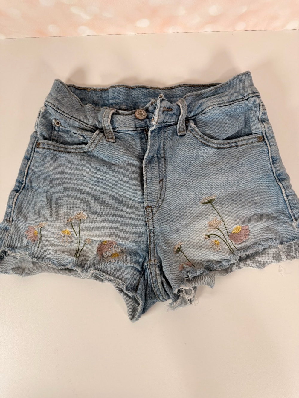 LEVI’S Light Wash Embroidered Denim Cutoff Shorts